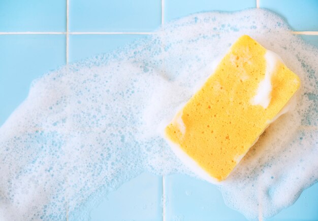 Free photo sponge washing with foam