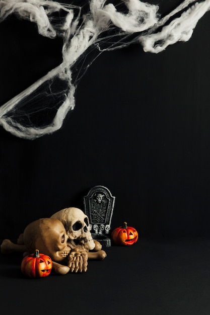 Spooky halloween decoration with skulls and cobweb