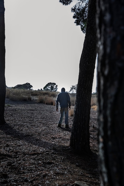 Spooky male zombie outdoors