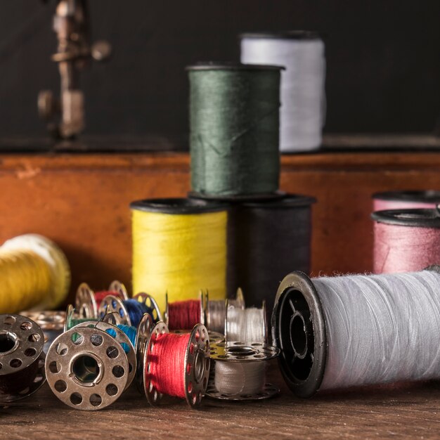 Spools of thread on table