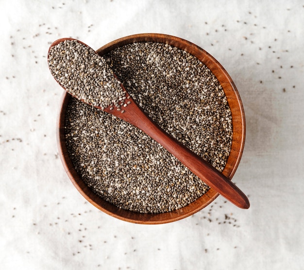 Spoon and bowl full of seeds