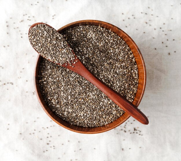 Spoon and bowl full of seeds