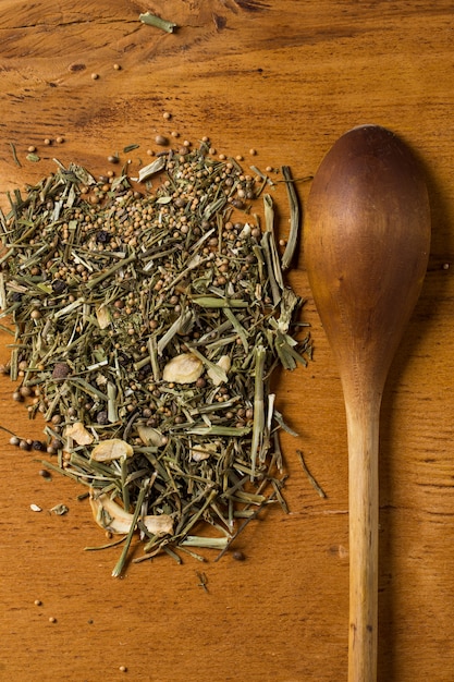 Free photo spoon and heap of greens on the table