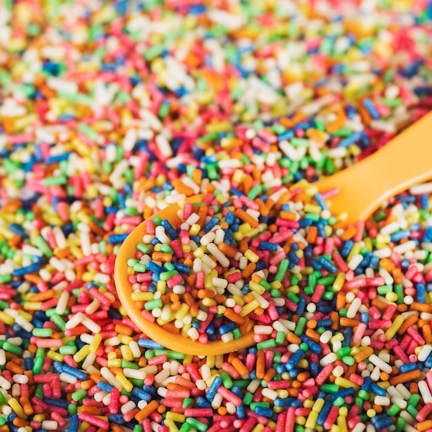 Spoon on heap of sprinkles