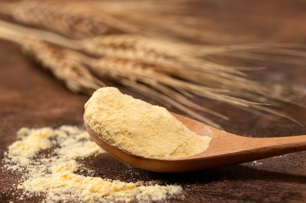 Spoon for ingredients full of flour