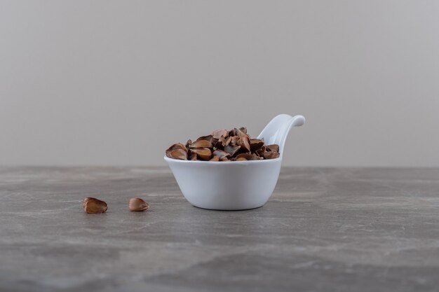 A spoonful of tasty kernel on the marble surface