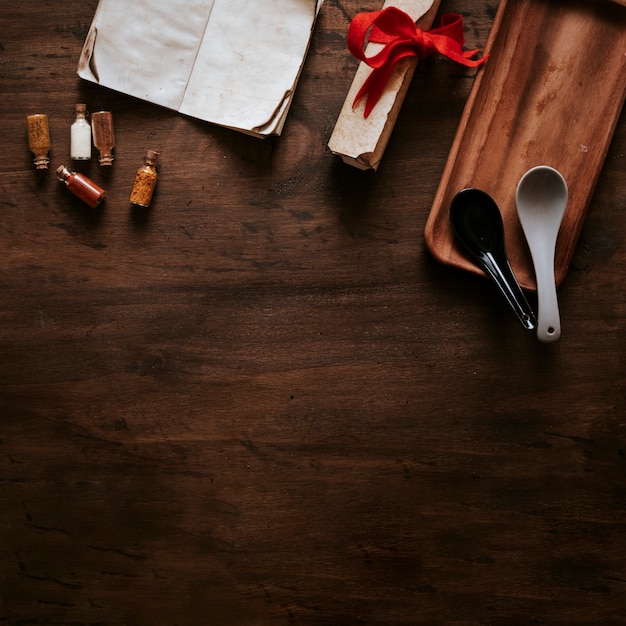 Spoons near ingredients and parchment