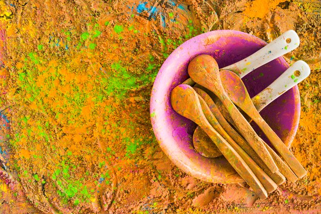 Spoons on painted table 