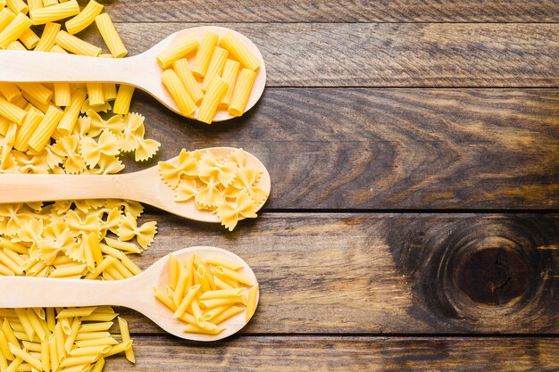 Spoons with assorted pasta