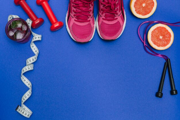 Sport equipment and pink trainers