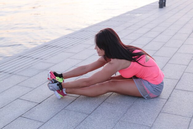 Sport outdoor, woman stretching