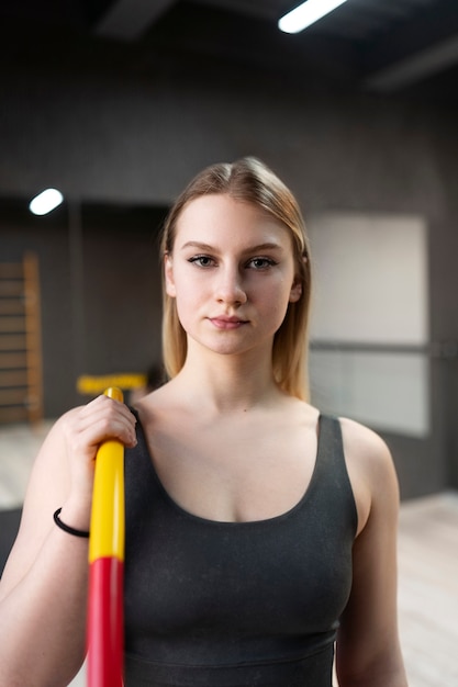 Free photo sport person training with hula hoop