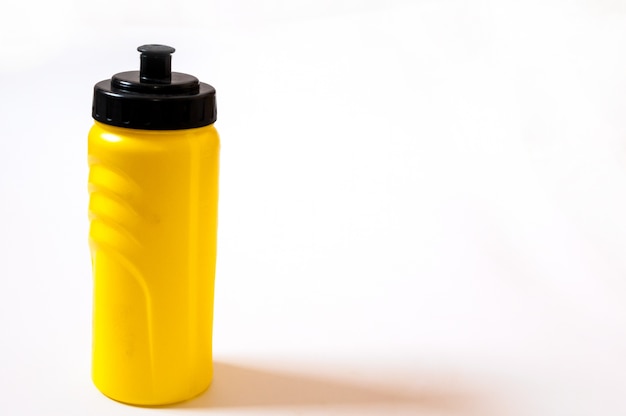 Free photo sport plastic water bottle on white