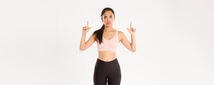 Free Photo sport wellbeing and active lifestyle concept upset and disappointed asian sportswoman woman in fitne
