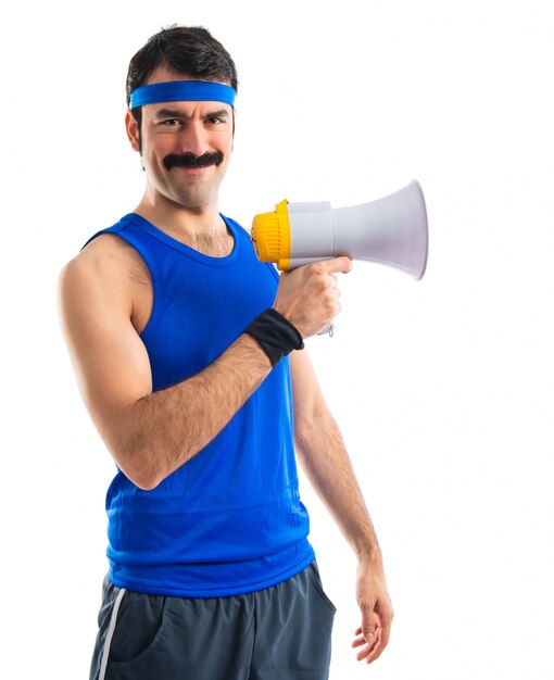 Sportman shouting by megaphone