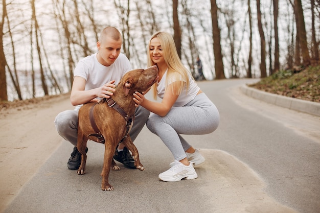 Sports couple in a summer park