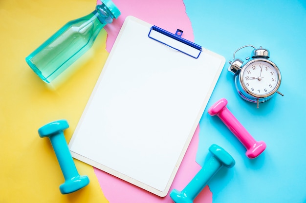 Sports equipment around clipboard