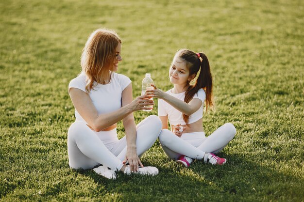 Sports family in a summer park