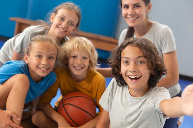 Sports teacher with her students