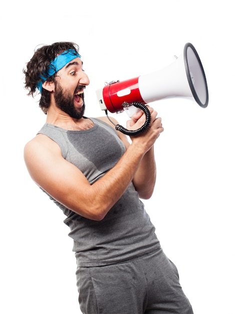 Free photo sportsman with a megaphone after running