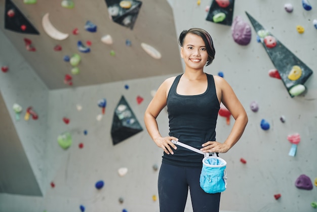 Sportswoman in climbing club