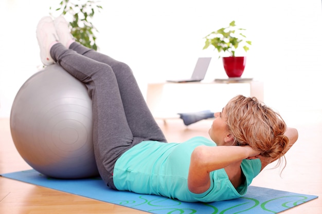 sportswoman doing exercises