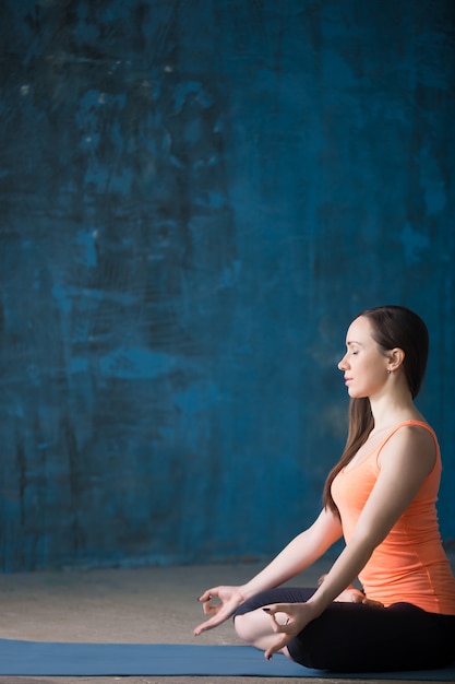 Sporty beautiful young woman contemplating