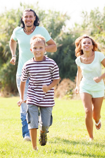 Free photo sporty family of three