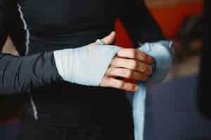 Free photo sporty man boxing. photo of boxer on a ring. strength and motivation