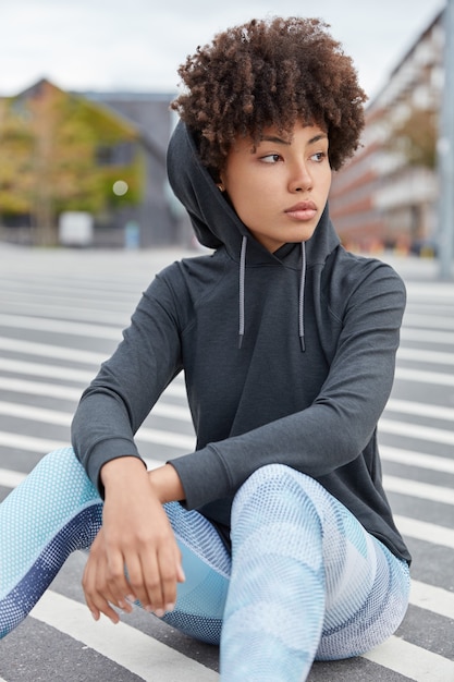 Sporty woman posing in outside setting