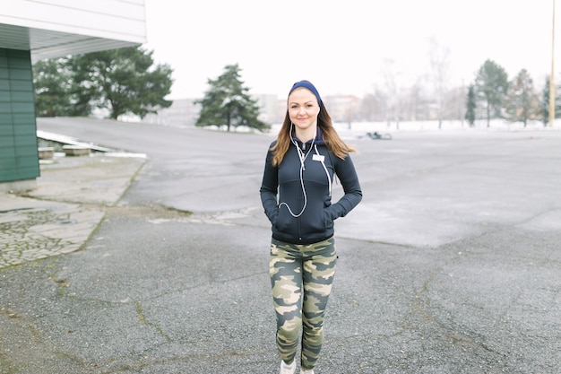 Sporty woman walking on training