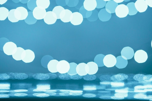 Spots of light on turquoise background Spots of light on turquoise background