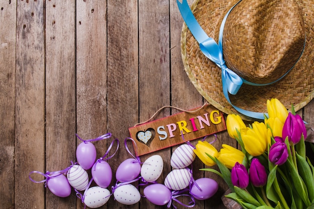 Spring background with flowers and easter eggs