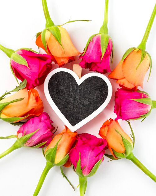 Spring flowers background with heart shaped box