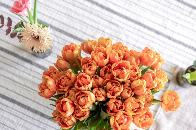 Spring flowers on the table serving and decoration concept top view