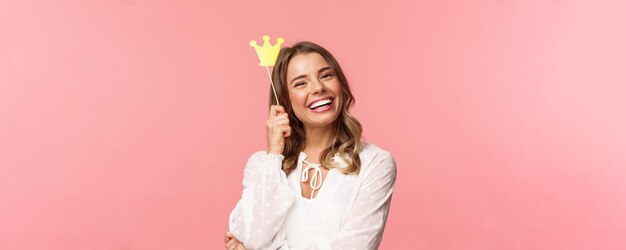 Spring happiness and celebration concept closeup portrait of charming smiling lovely blond girl hold