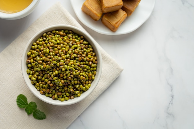 Sprouts seed in white small bowl