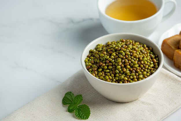 Sprouts seed in white small bowl