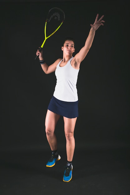 Free photo squash player serving a ball