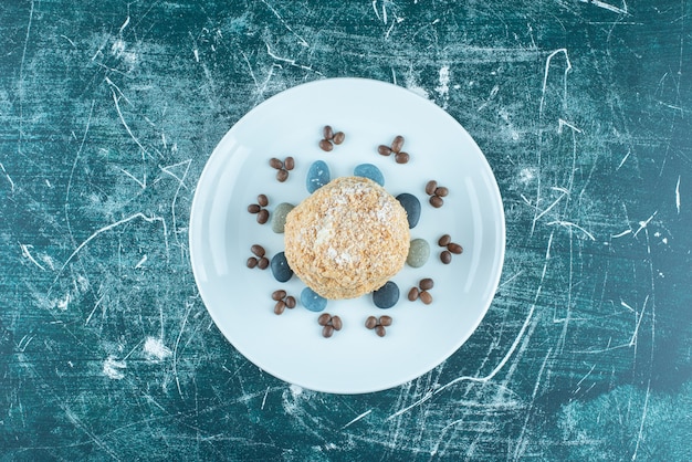 squirrel-cake-platter-with-candy-rocks-coffee-beans-blue_114579-24649.jpg