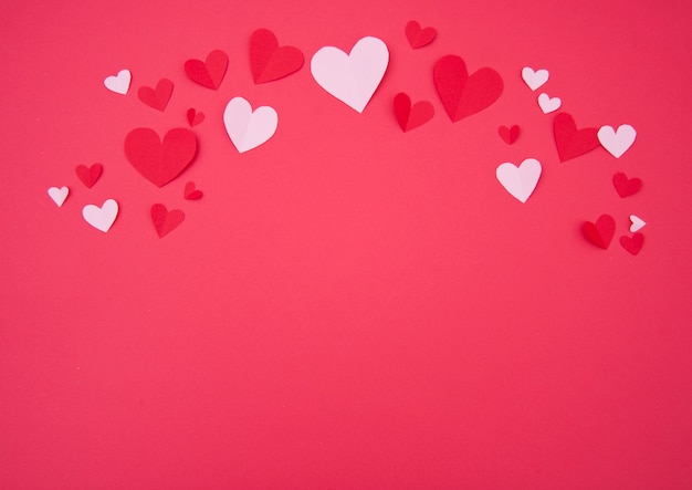 St. Valentine’s Background with Pink and Red Paper Hearts