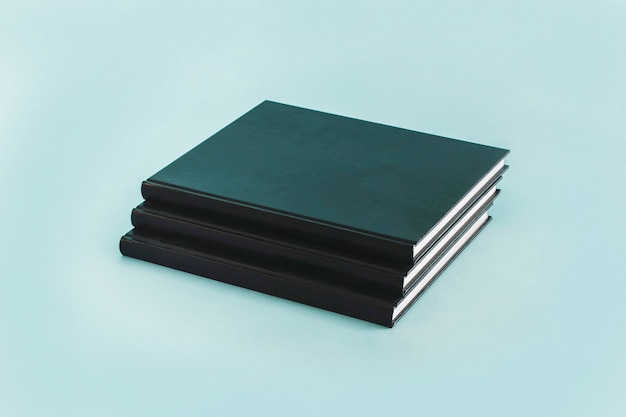 Stack of black notebooks