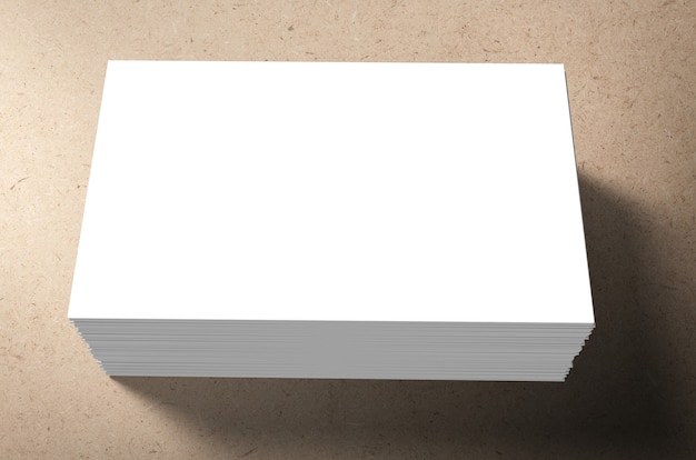 Stack of blank name cards on brown background