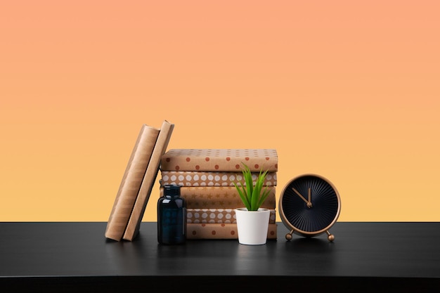 Stack of books on black wooden table