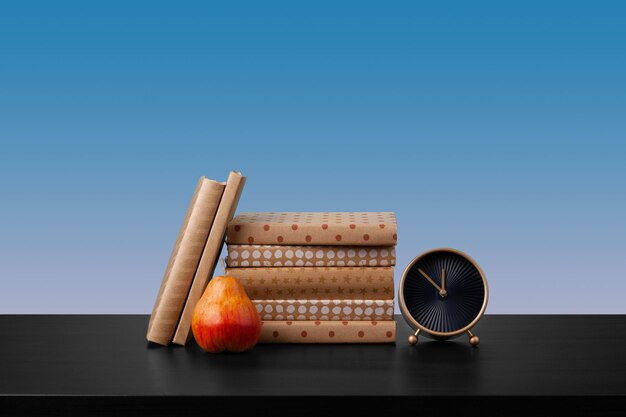 Stack of books on black wooden table