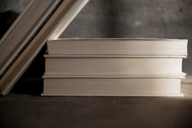 Stack of books on gray