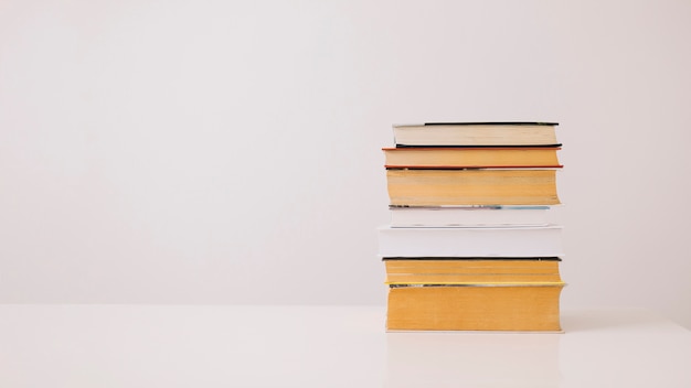 Stack of books on white