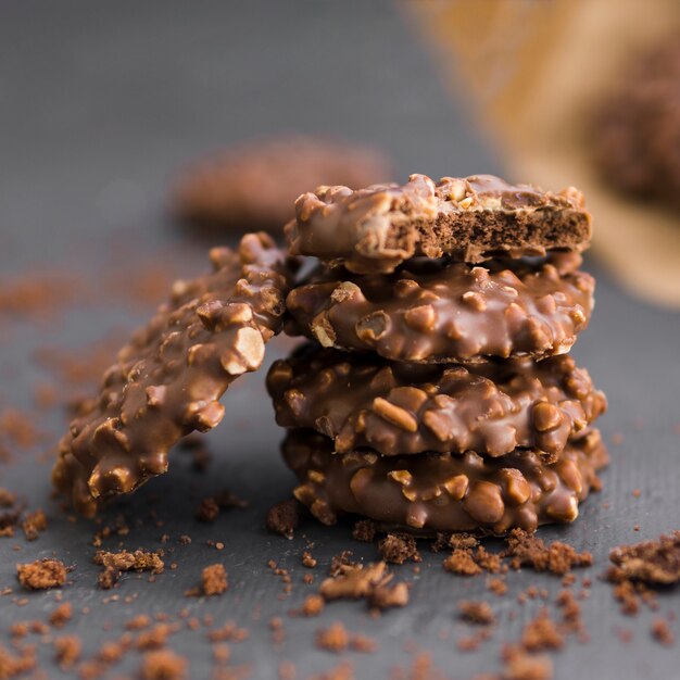 Stack of chocolate cookies with nuts