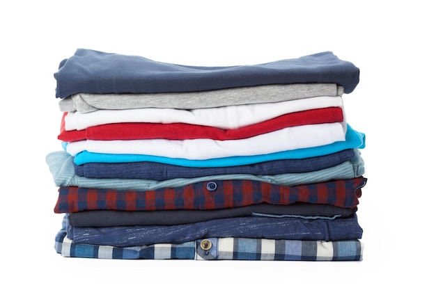 Stack of clothes on white background closeup