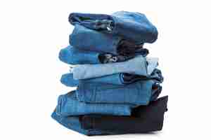 Free photo stack of clothes on white background closeup